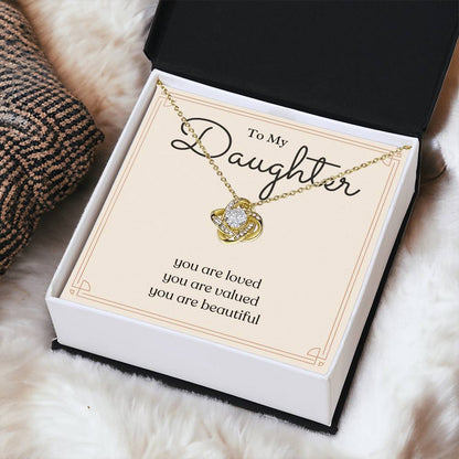 To My Daughter loved valued beautiful message card necklace, yellow gold standard box, angled fabric